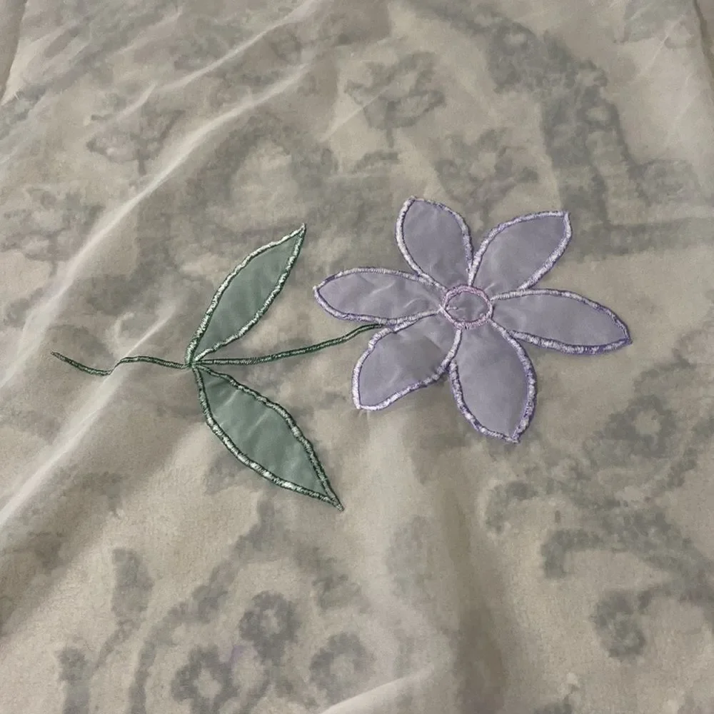 Shower curtain, white background flowers in yellow green purple
